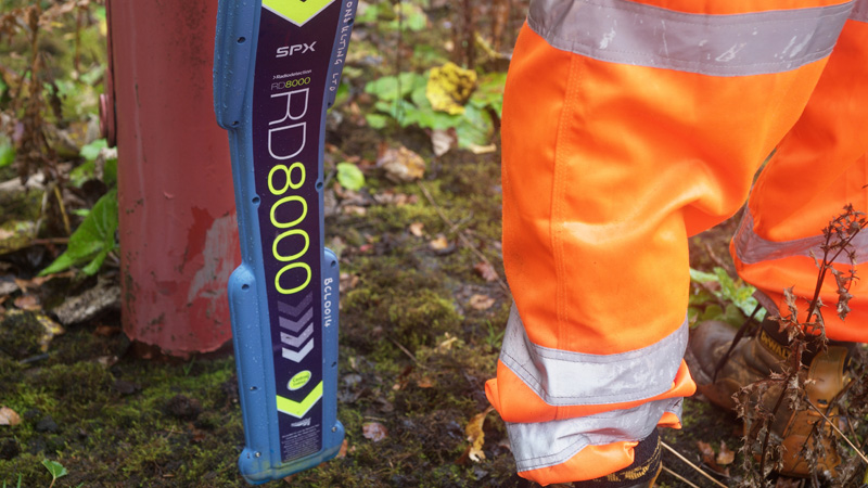 Bridgeway engineer using utility detection equipment on site